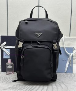 Prada's new parachute backpack features a triangular enamel badge logo, adjustable nylon shoxwoa0yyt