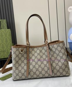 Gucci The GG shopping bag, with its distinctive GG pattern and striped ribbon, is a classic kip6k8i9