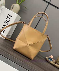 Loewe Bags . L ⊚℮ W ℮ The New Mini Shiny Cowhide Puzzle Fold Handbag Draws Inspiration From The Geometric 50pxvtaw